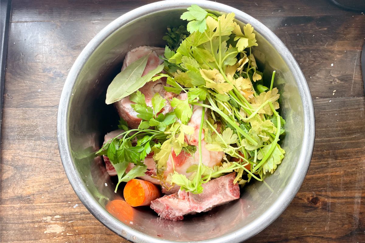 pot of bone broth and veggies